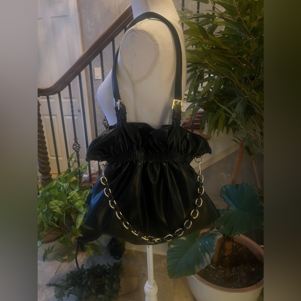 Ladies dress black bag. No brand brand new. Never used. NWOT. Black and gold. - Picture 6 of 15